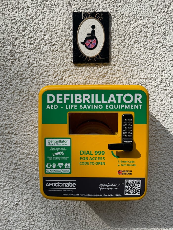 Close-up of a public defibrillator box in Swindon, England. Essential life-saving equipment.